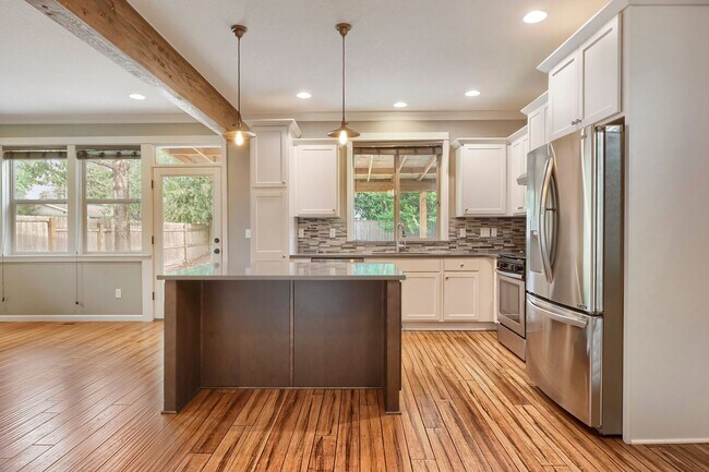 Building Photo - Custom-Built 4BR/2.5BA Two-Story Near Woodstock — Quartz Island Kitchen, Gas Fireplace & Fenced Y...