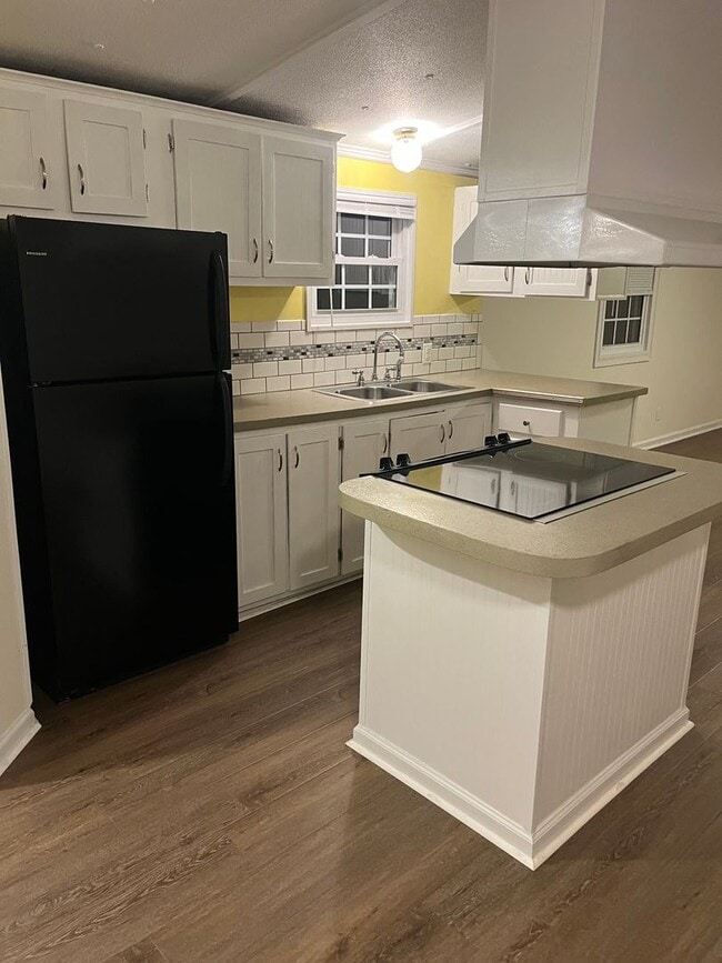 Building Photo - Secluded Open Floor Plan Mobile Home