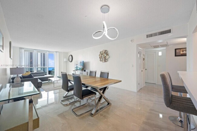 Building Photo - 19370 Collins Ave