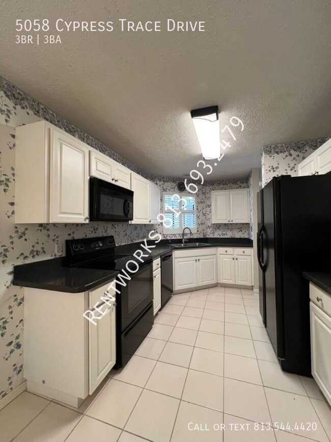 Building Photo - 5058 Cypress Trace Dr