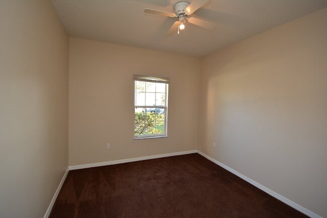Building Photo - "Spacious 4-Bed Oasis in Palm Coast with 2...