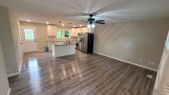 Living room Kitchen area - 400 N Third Ave