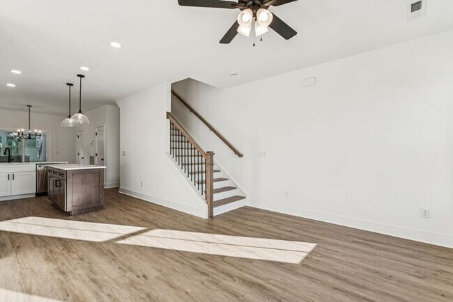 Building Photo - High-End 2BR Townhome | Rooftop Terrace + 2-Car Garage | 24-Unit Commnity
