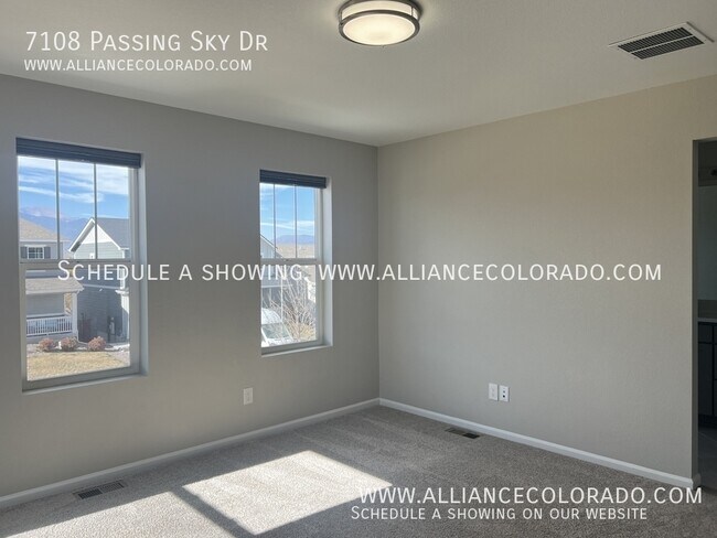 Building Photo - 7108 Passing Sky Dr