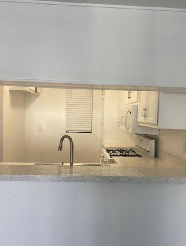 Building Photo - Step into luxury living with this exquisite 2 bedroom 2 bath 3rd floor condo at Emerald Villas