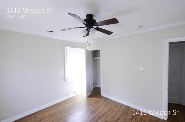 Building Photo - RENOVATED 3 Bed, 3 Bath with 2 Car Enclose...