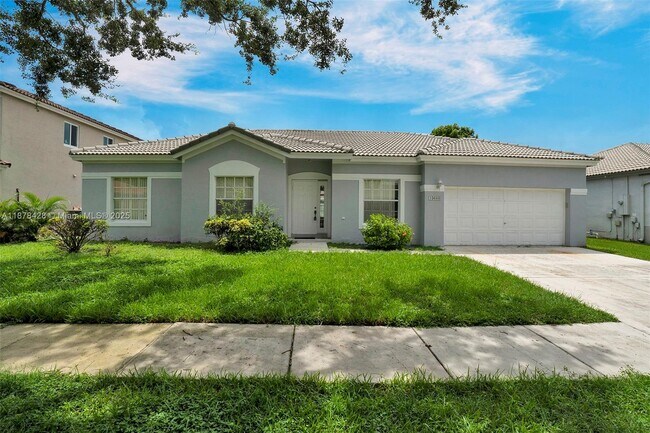 Building Photo - 10660 SW 20th Ct