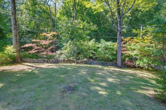 Building Photo - Classic Brick Multi-Level Home with Backya...