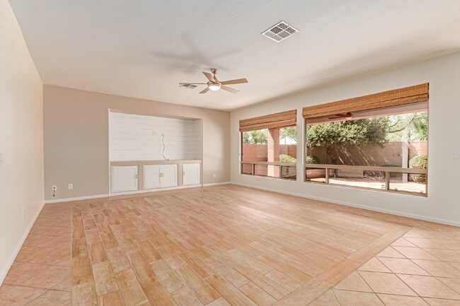 Building Photo - "Charming 2-Bedroom + Den Oasis with Spaci...