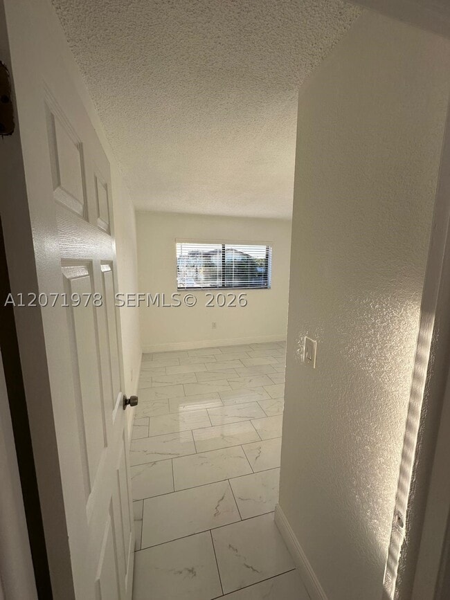 Building Photo - 7401 SW 152nd Ave