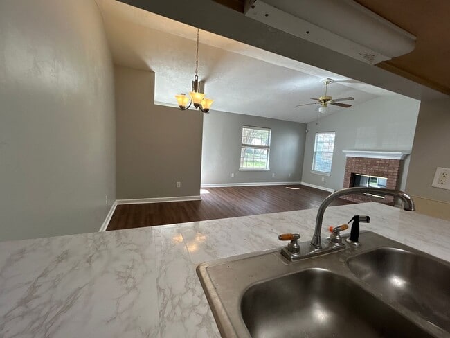 Building Photo - 2BR/2BA Townhome. BRAND NEW FLOORS