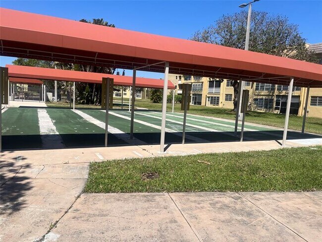 Building Photo - 6090 NW 64th Ave