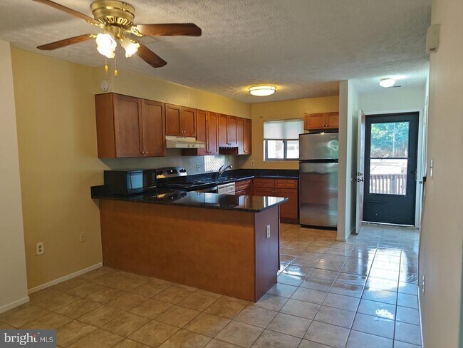 Building Photo - 15245 Coachman Terrace