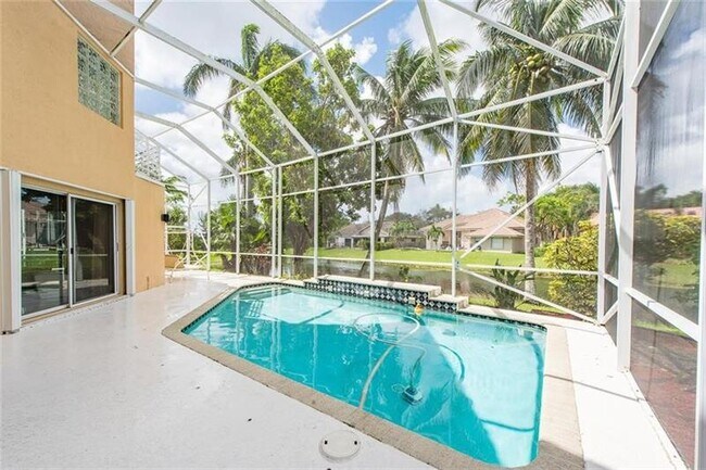 Building Photo - 5911 NW 59th Ave