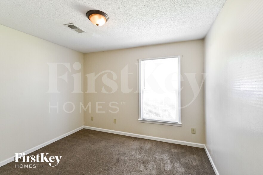 Building Photo - 8441 Woolrich Dr