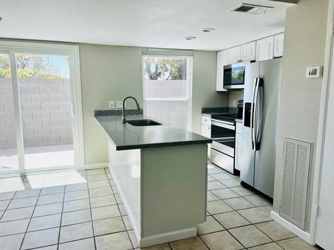 Kitchen View 2 - 264 E Betty Elyse Ln