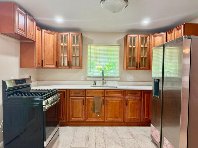 Building Photo - Fully Renovated 3-Bedroom Corner Home with Private Yard & 2-Car Garage