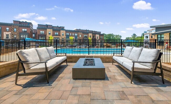 Building Photo - Sophisticated Rockville Corner Condo with Resort-Style Amenities, 2 Garage Parking Spaces