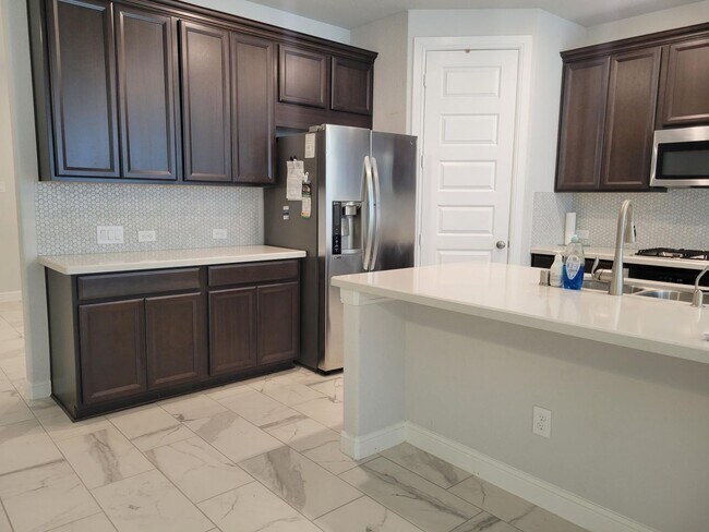 Building Photo - One-Story, 4 Bedroom Available!