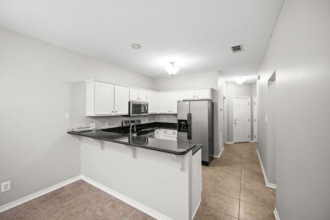 Building Photo - Great find in Foley Complex!