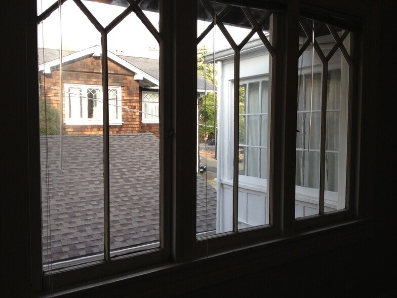 Single, carpeted bedroom View - 2615 Parker St