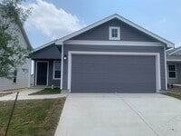 Building Photo - *COMING SOON* Comfortable Living with Open Kitchen & Fenced Yard!