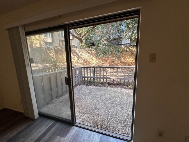 Building Photo - Spacious 2 story townhome in gated and gua...