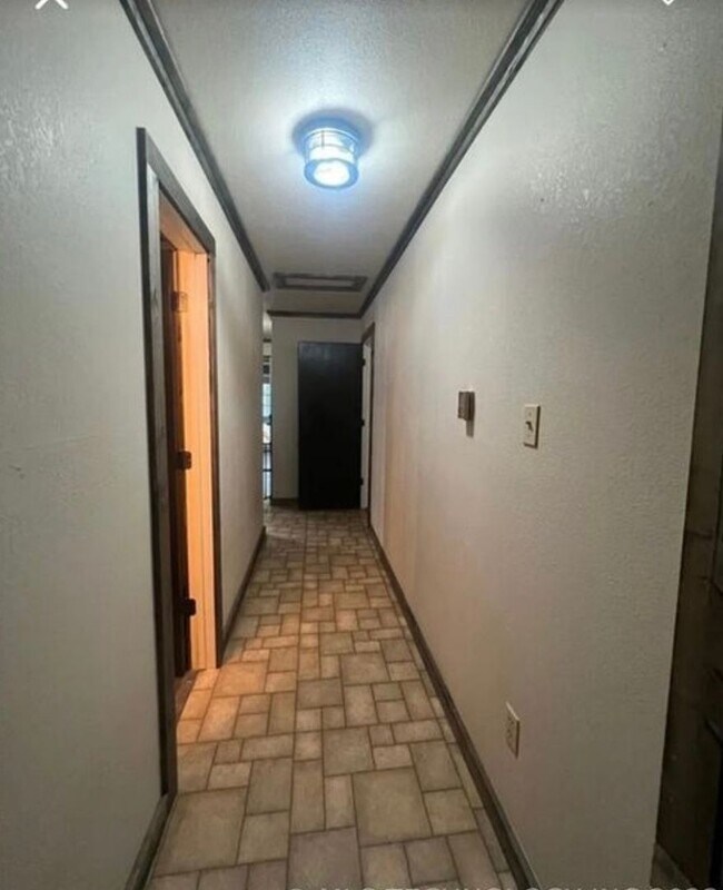 Building Photo - Charming 2BR House in Hartshorne