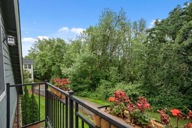 Building Photo - 2 Creeks Condominiums - Gated Community on...