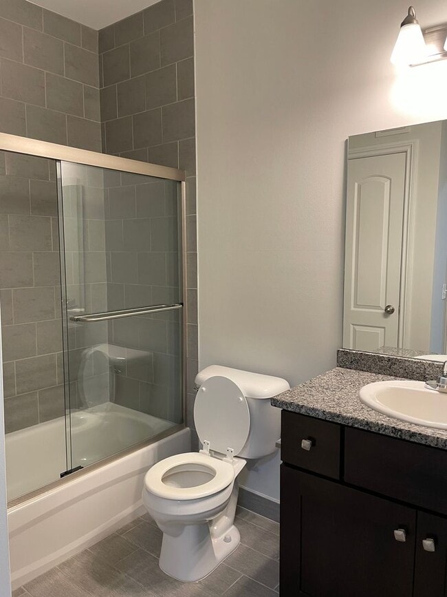 Building Photo - Shelby Township, 2-Bedroom, 2- Baths, Private Balcony with att. Garage