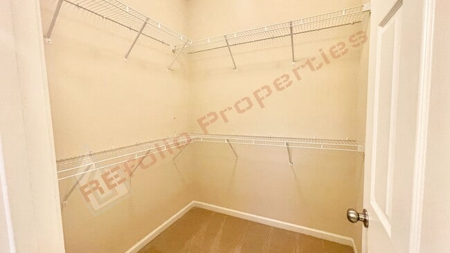 Building Photo - 3 Story Townhome 3 Bedrooms Rear Entry 2 Car Attached Garage with 1st Floor Bedroom, Community Po...