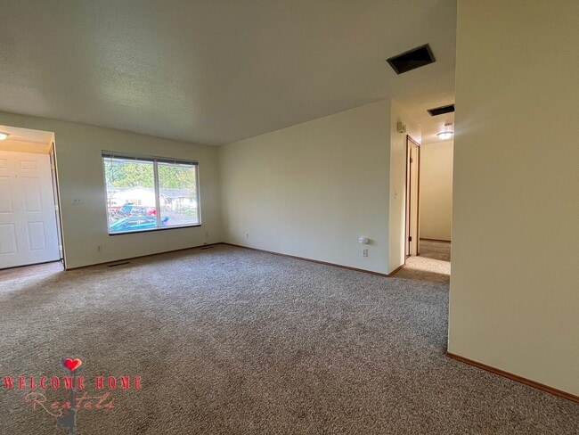 Building Photo - Beautiful Remodeled Rambler!!!  Come enjoy this HUGE backyard!!  NEW CARPET!!