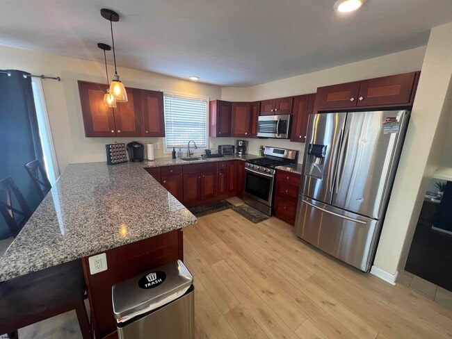 Building Photo - 239 N Derby Ave