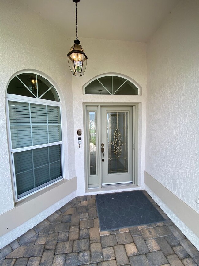 Building Photo - Gorgeous 3 + 2 Turnkey ANNUAL Lease w/Swim Spa & Large Private Screened in Patio In The Village o...