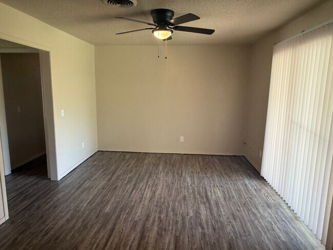 Building Photo - New paint and appliances, luxury vinyl plank and a fenced yard, these 3 beds 1.5 bath is ready fo...