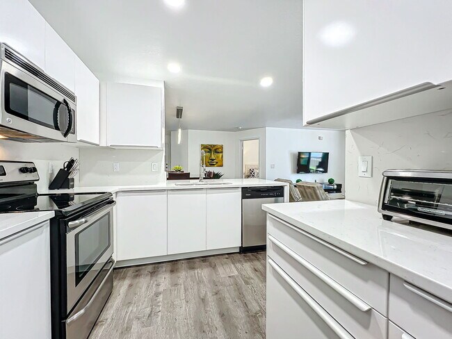 Building Photo - Seurat Street, Orlando, FL 32819 - 4 BR 2 BA condo