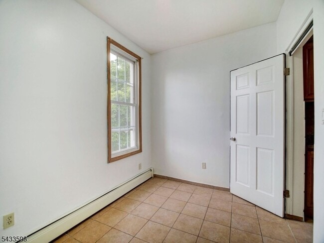 Building Photo - 921 Paterson Plank Rd