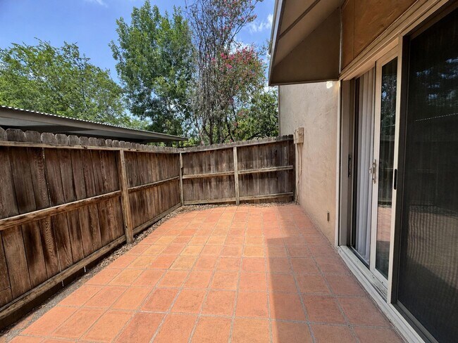 Building Photo - Single-level living on ground floor  |  Fresh paint (July 2026)  |  2 carports  |  Community Pool...