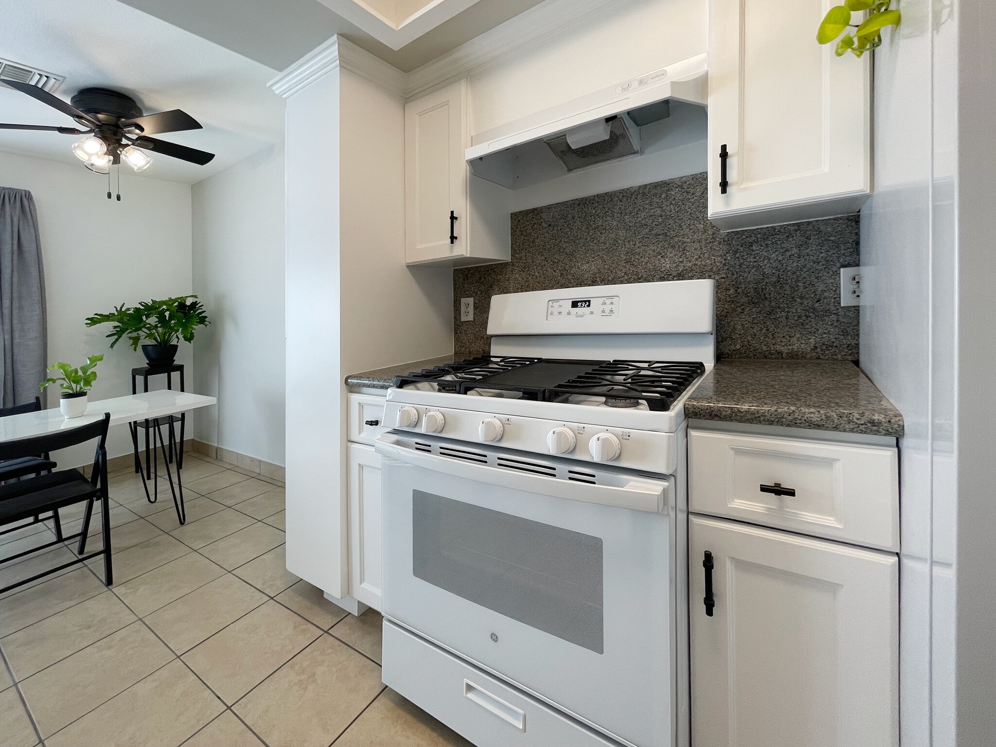 GE Stove & NEW vent hood - 9047 Langdon Ave
