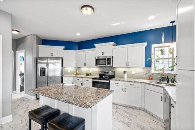 Building Photo - Stunning Home in Wellington Fields Ready f...