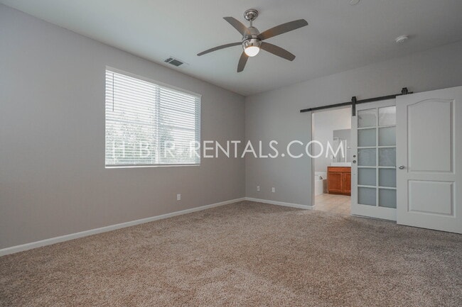 Building Photo - Questa Village: Spacious 3-Bedroom Retreat...
