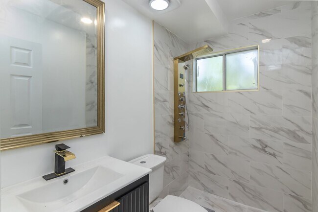Building Photo - Refreshed 5-bedroom, 3-bathroom home locat...
