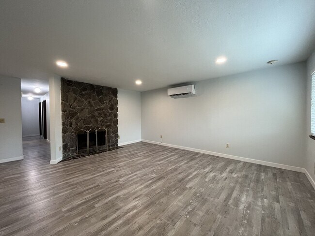 Building Photo - Single-Level 3-Bedroom Home with 2-Car Garage, Mini-Split AC, & Backyard Garden Space