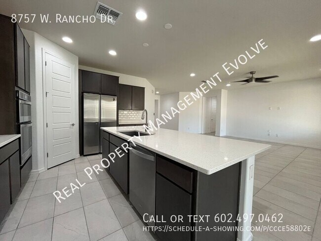 Building Photo - 8757 W Rancho Dr