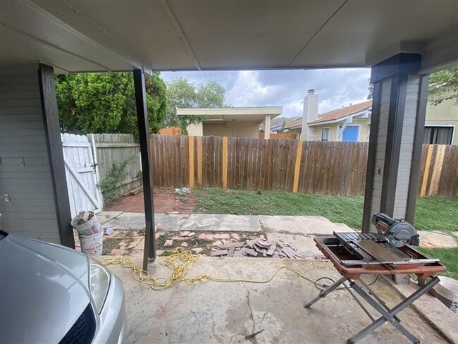 Building Photo - Large 2/2 duplex with a 2 car carport