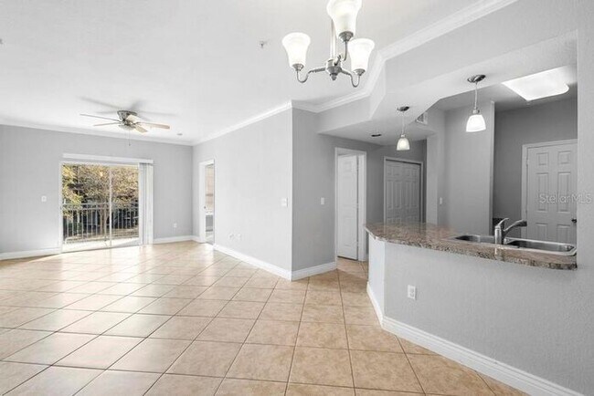 Building Photo - Free application fees 2 Bedroom condo with 2 Baths and balcony minutes from The Mall at Millenia
