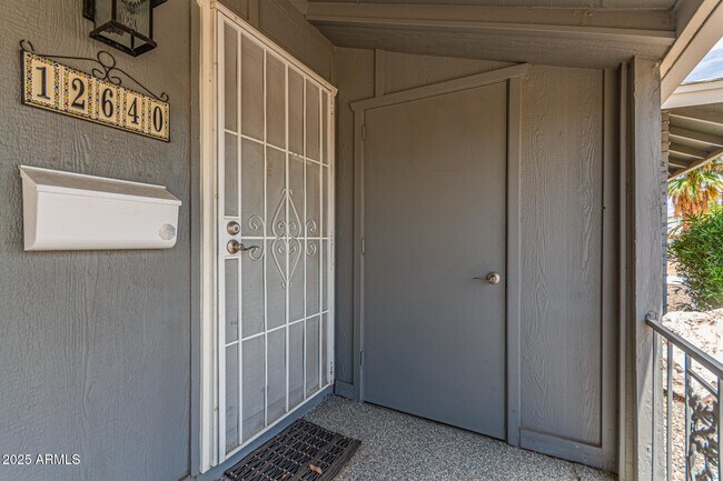 Building Photo - 12640 N Pebble Beach Dr