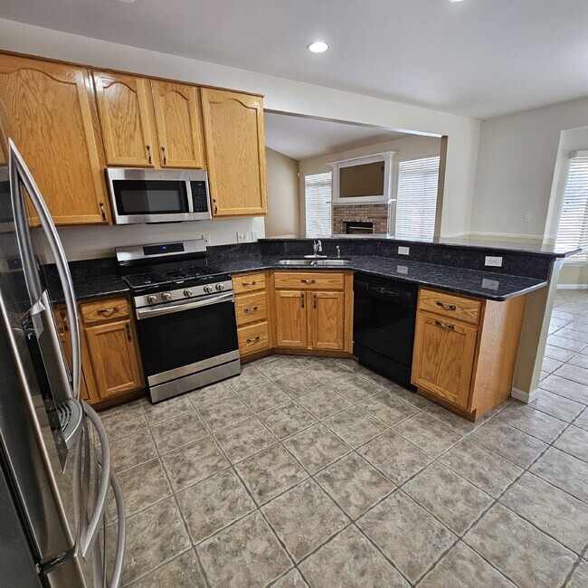 Building Photo - 3 Bedroom, 3.5 Bath Ranch with Open Floor Plan, Finished Basement & Scenic Pond Views