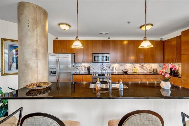 Building Photo - 711 Cosmopolitan Dr NE