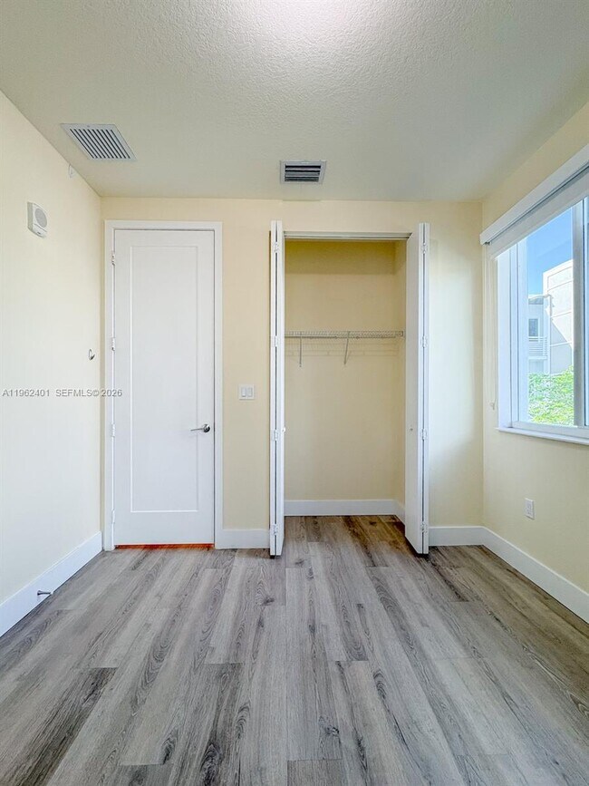 Building Photo - 6416 NW 102nd Ct